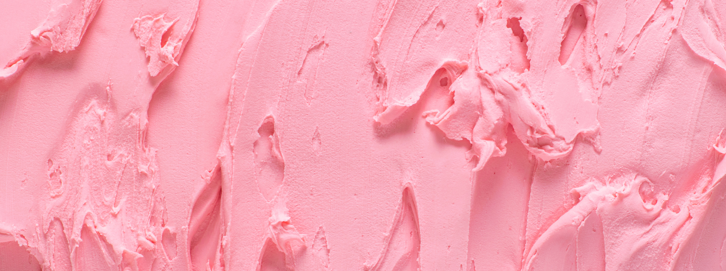 Texture surface of ice cream. Background of strawberry ice cream close-up. Banner